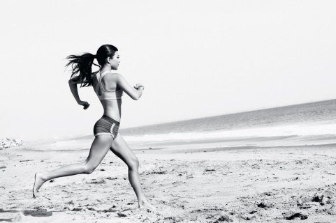 Kourtney Kardashian running outside